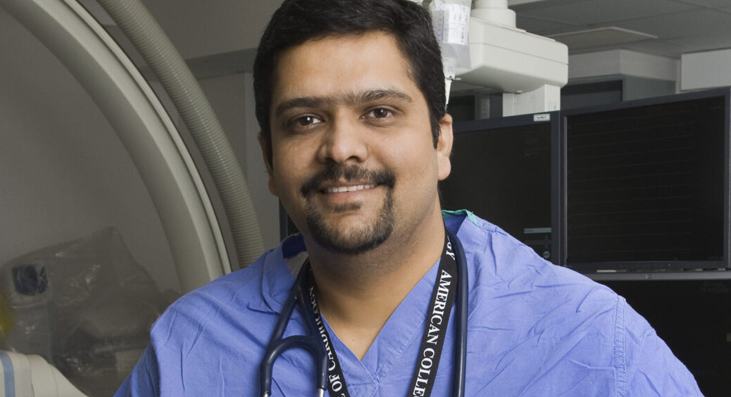 Doctor holding a model of a heart